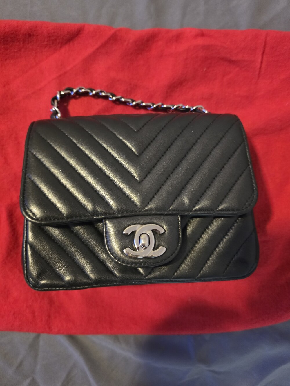 CHANEL Black Chevron Quilted Leather Shoulder Bag with Silver CC